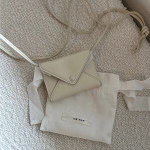 The Row Ivory Mini Crossbody Envelope Bag